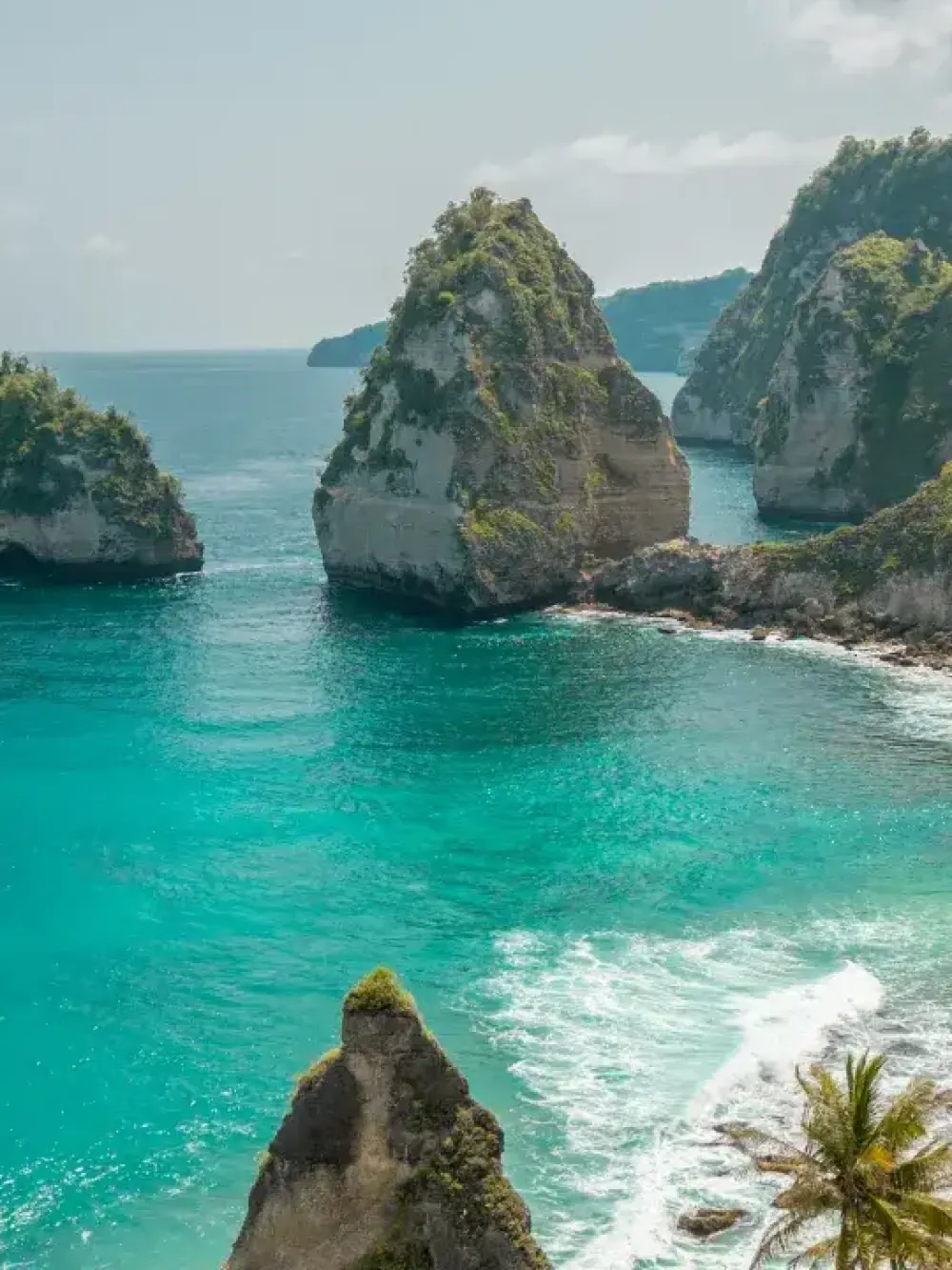 Limestone sea stacks and turquoise water off Nusa Penida