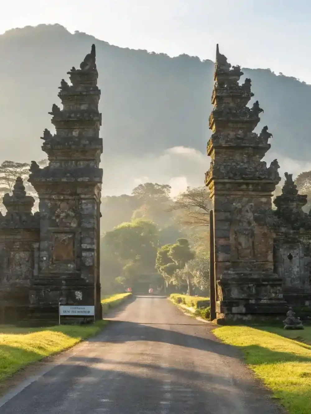 Traditional Balinese gate framing the highland landscape